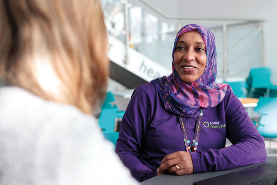 Torus Foundation employment advisor talking to tenant